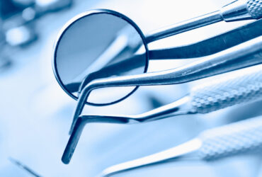 dentist's instruments with shallow depth of field blue tinted